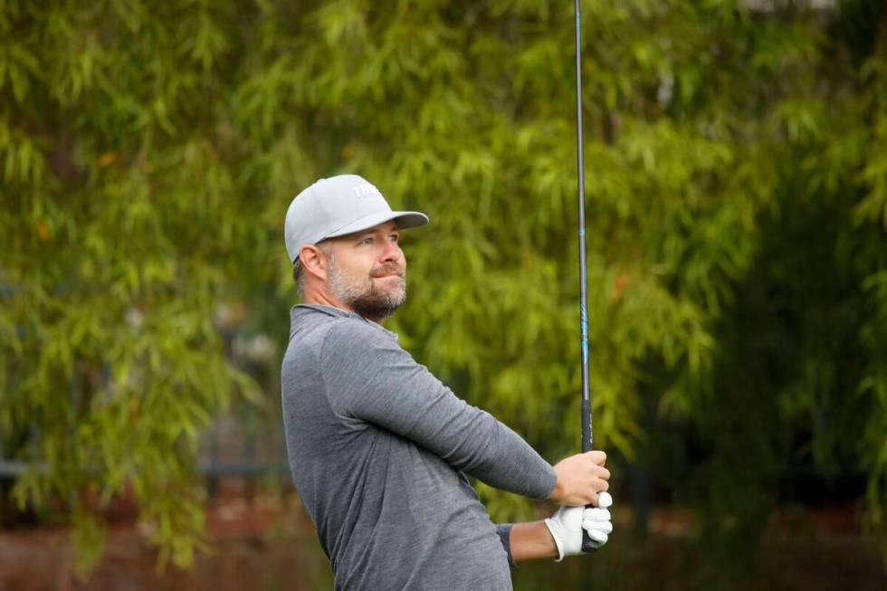 Ryan Moore of Las Vegas watches his tee shot on the 11th hole during the first round of the Shr ...