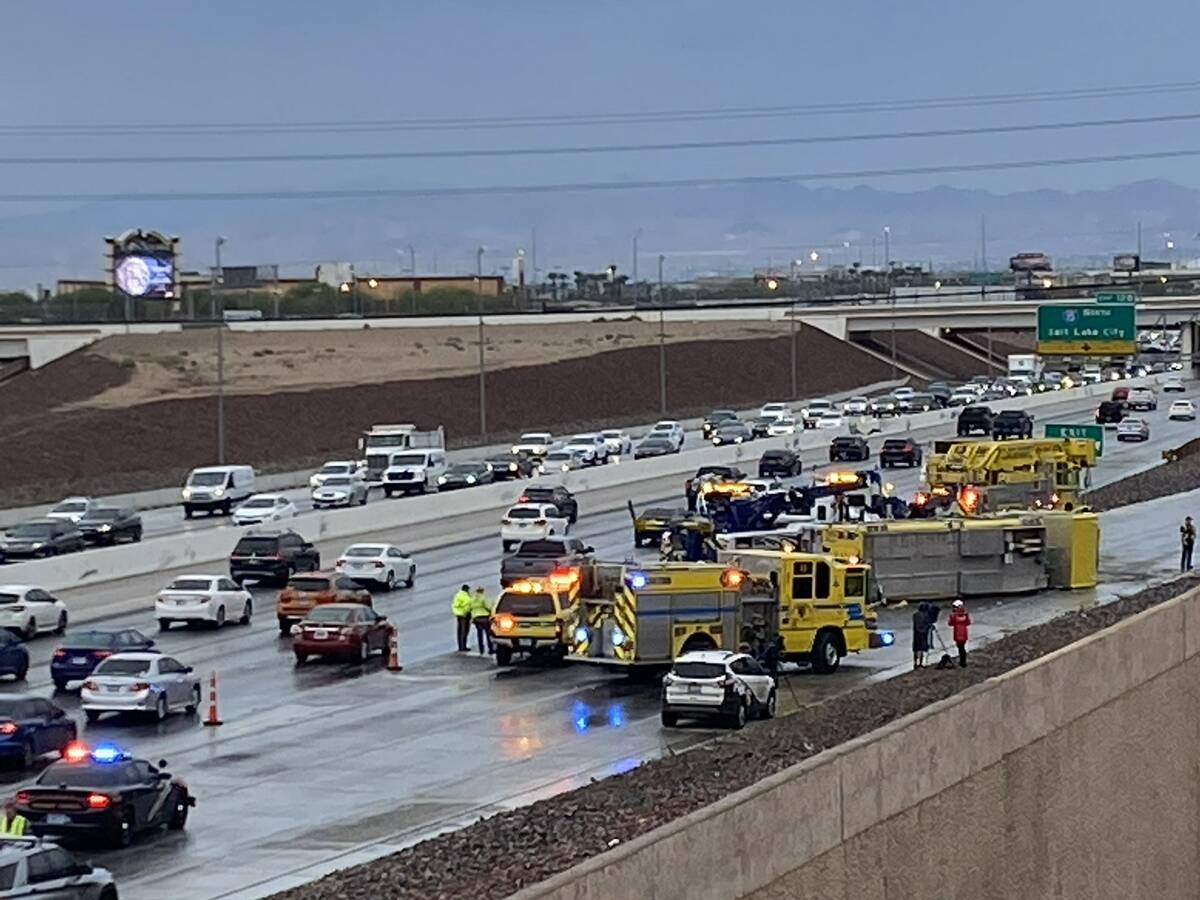 A Clark County fire truck has overturned on the 215 Beltway. (Glenn Puit/Las Vegas Review-Journal)