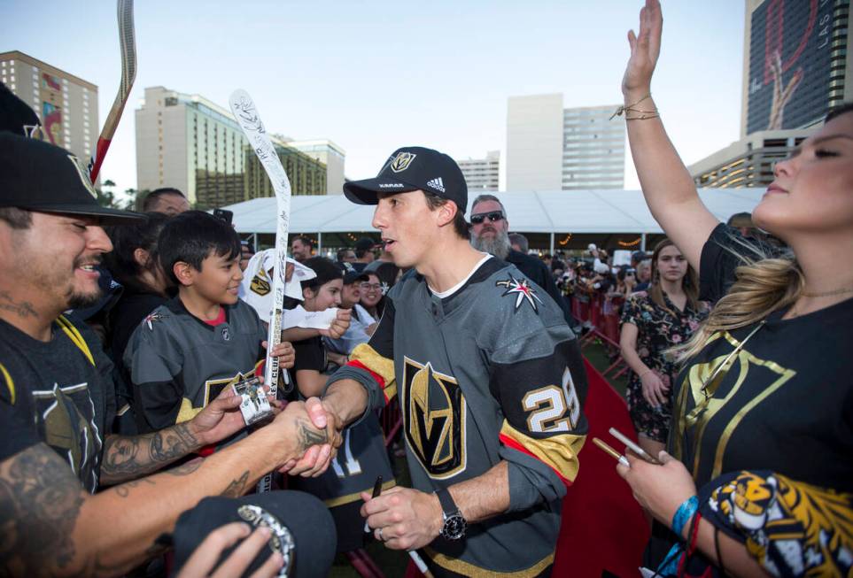 Vegas Golden Knights goaltender Marc-Andre Fleury (29), center, greets fans during a Vegas Gold ...