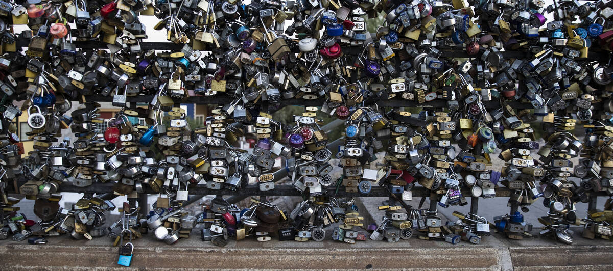 Love padlocks left by visitors are seen on London Bridge on Sunday, Oct. 3, 2021, in Lake Havas ...