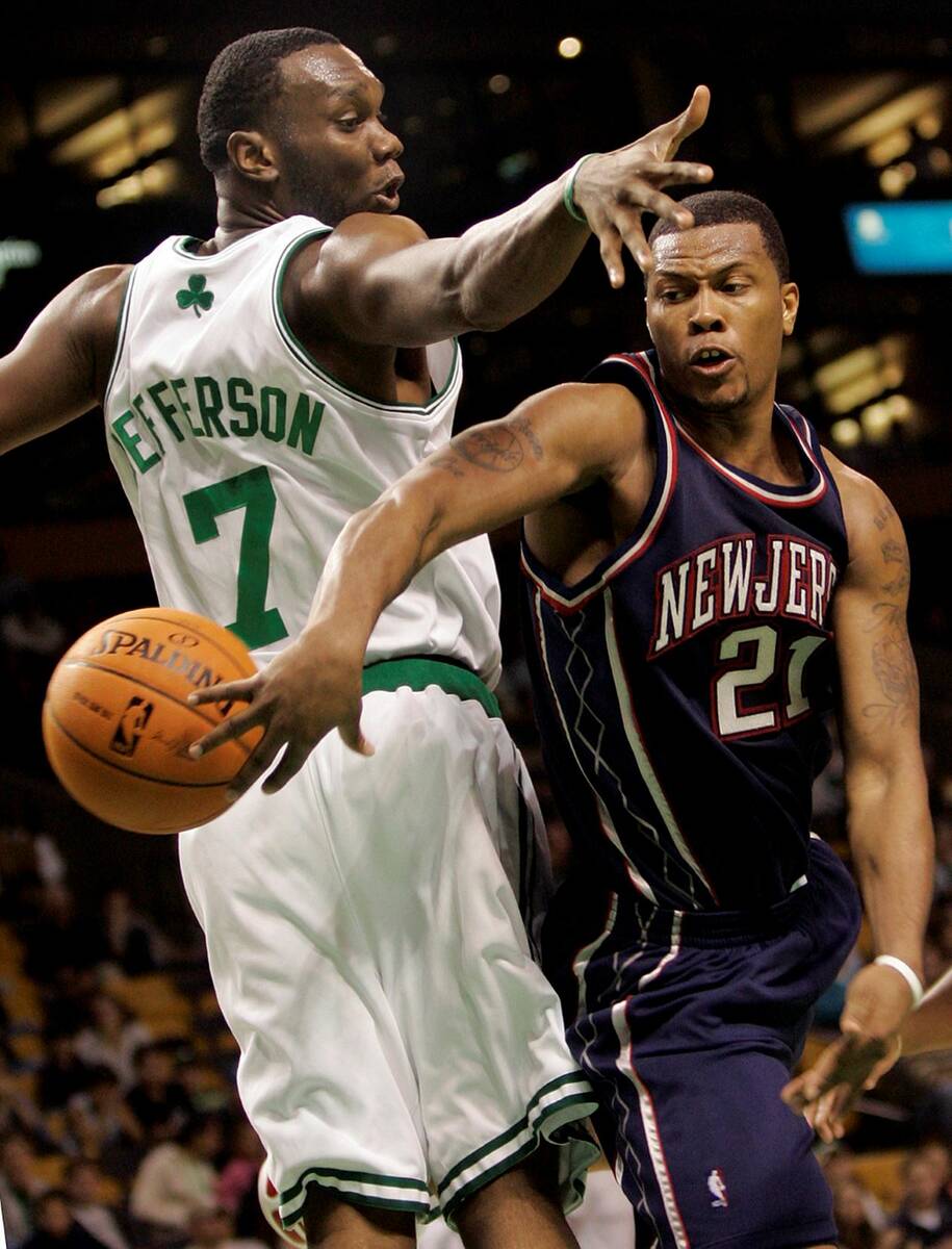 Boston Celtics' Al Jefferson tries to stop New Jersey Nets' Antoine Wright in October 2006. (AP ...