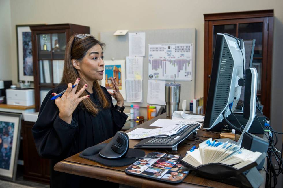 District Judge Bita Yeager conducts mental health court remotely from her chambers at the Regio ...