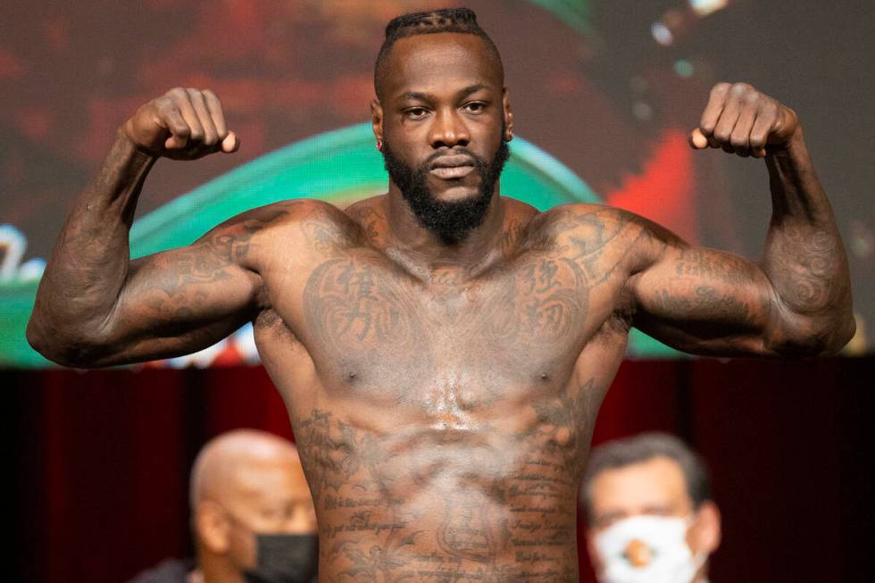 Deontay Wilder poses during a weigh-in event at the MGM Grand Garden Arena in Las Vegas, Friday ...