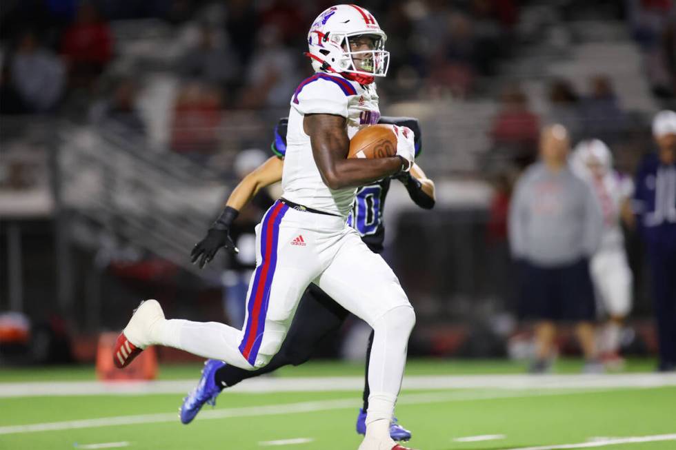 Liberty's Germie Bernard (2) runs the ball after a catch for a touchdown in the first half of a ...