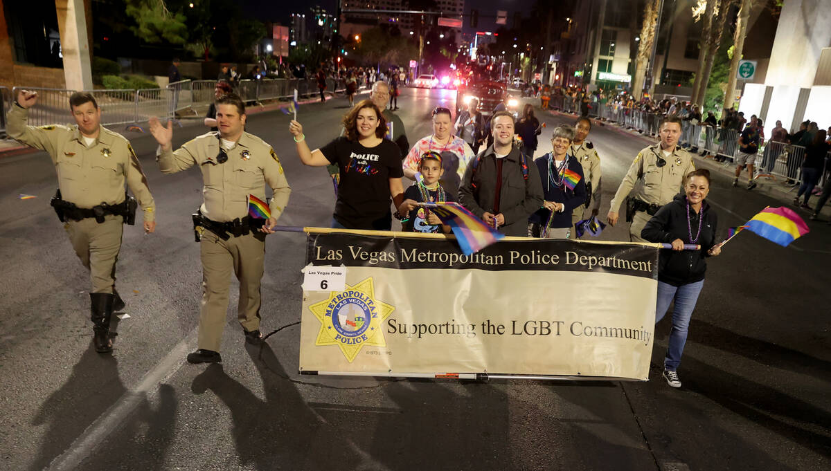 Members of the Metropolitan Police Department entry march in the Las Vegas Pride Night parade d ...