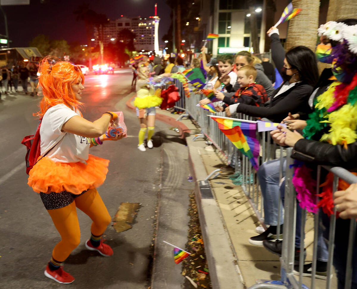Members of the City of Las Vegas entry, including Jasmine Freeman, left, march in the Las Vegas ...