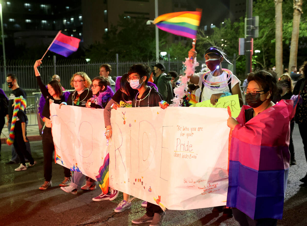 Members of Clark County School District entry march in the Las Vegas Pride Night parade downtow ...