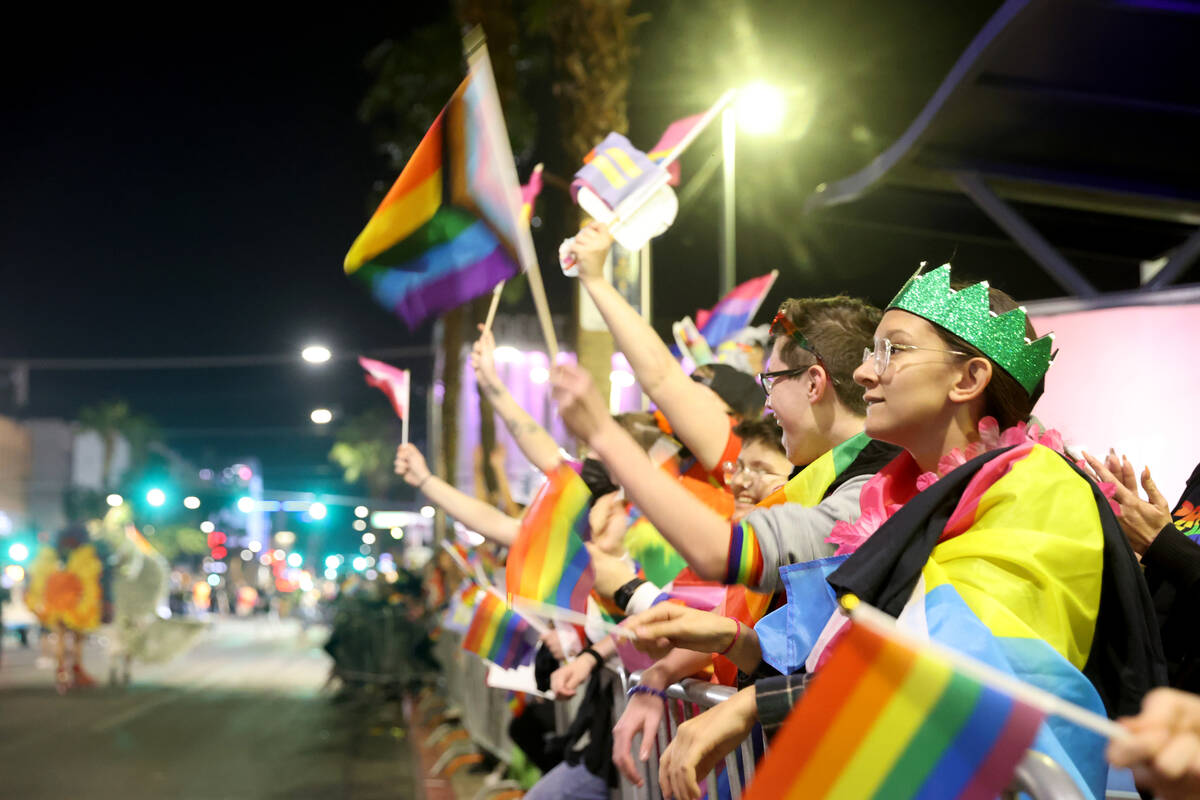 People watch the Las Vegas Pride Night parade downtown Friday, Oct. 8, 2021. (K.M. Cannon/Las V ...