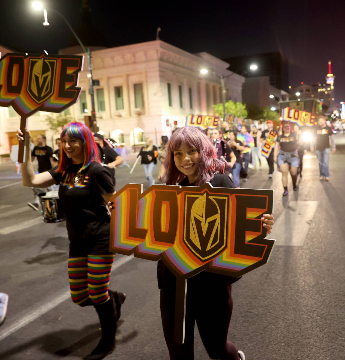 Members of the Vegas Golden Knights entry march in the Las Vegas Pride Night parade downtown Fr ...