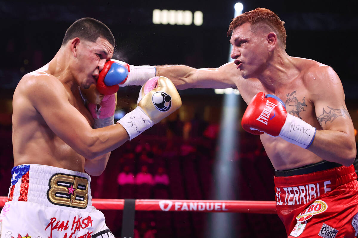 Marcelo Esteban Coceres, right, lands a punch against Edgar Berlanga in the eight round of a mi ...