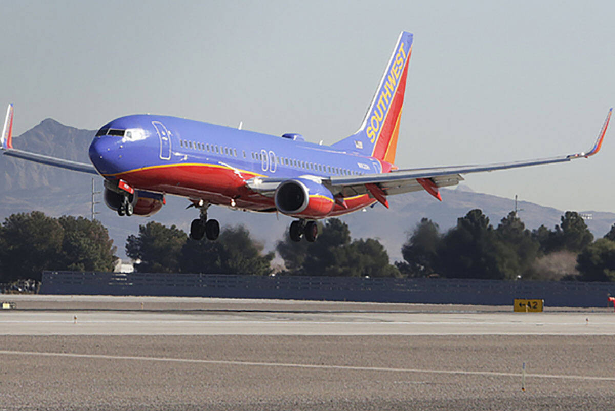 A Southwest Airlines plane prepares to land at McCarran International Airport in Las Vegas. (Bi ...