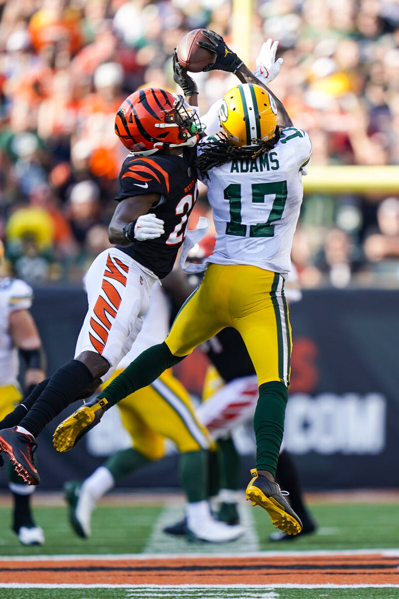 Green Bay Packers wide receiver Davante Adams (17) makes a catch over Cincinnati Bengals corner ...
