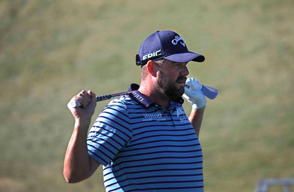 Marc Leishman reacts after teeing off on the 17th hole during the final round of the Shriners H ...