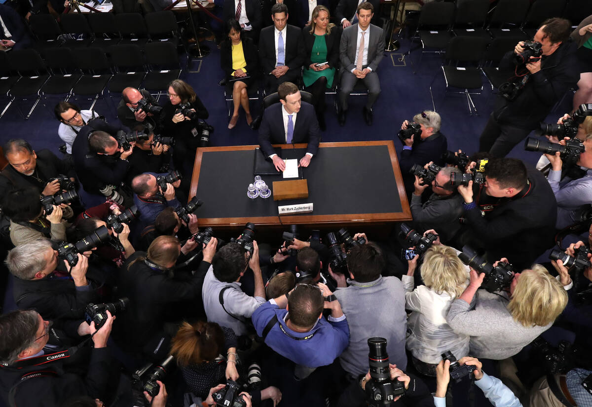 Facebook CEO Mark Zuckerberg arrives to testify before a joint hearing of the Commerce and Judi ...
