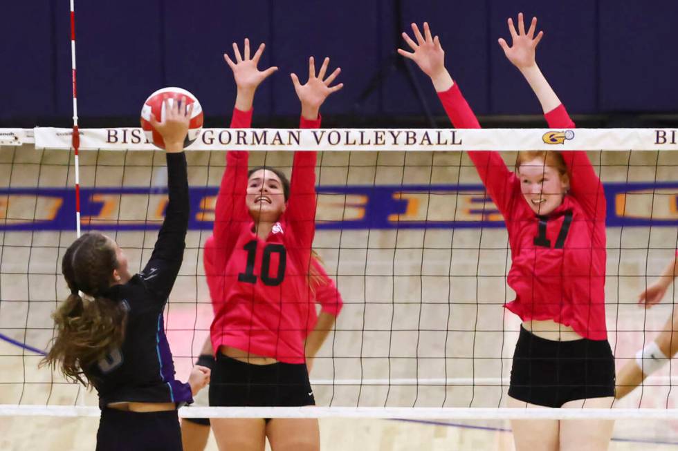 Silverado's Carlee Brooks (8) sends the ball over the net against Bishop Gorman's setter Caroli ...