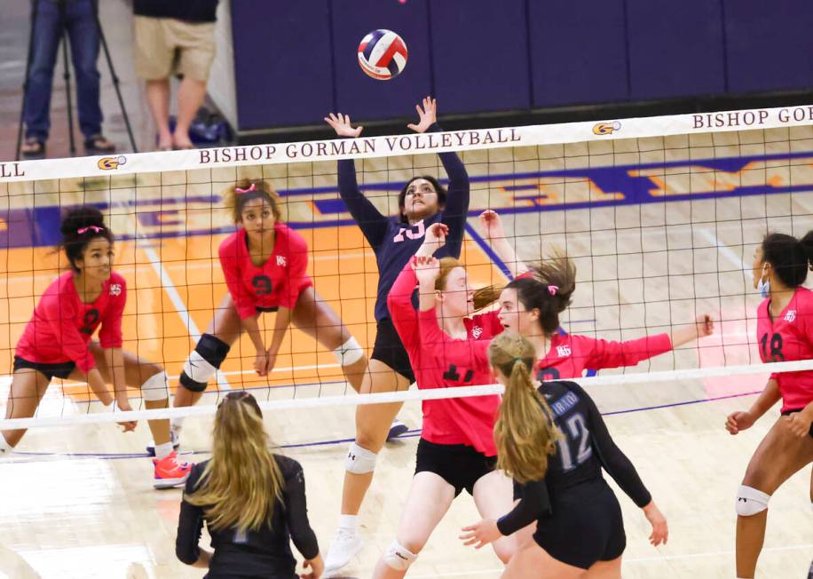 Bishop Gorman's Tatum Thompson (13) hits the ball against Silverado during a volleyball game at ...