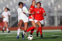 Centennial's Syrena Taylor (13) and Arbor View's Isabella Srodes (16) compete for the ball duri ...