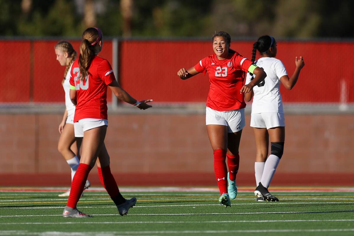 Arbor View's Tiana Beavers (23) reacts after scoring a goal against Centennial during the first ...