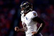 Baltimore Ravens quarterback Lamar Jackson (8) takes the field during the second half of an NFL ...