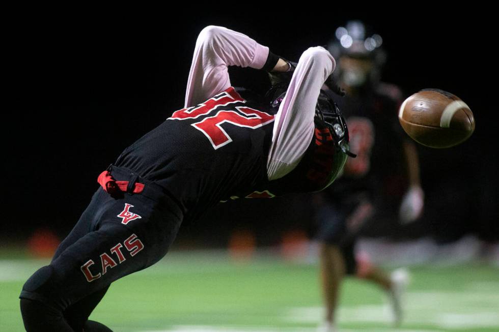 Las Vegas' running back Camden Bradshaw dives backwards but misses a catch during the second ha ...