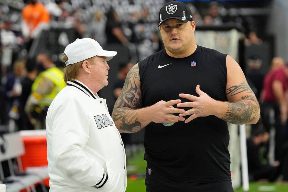 Raiders offensive guard Richie Incognito, right, speaks with owner Mark Davis before an NFL foo ...