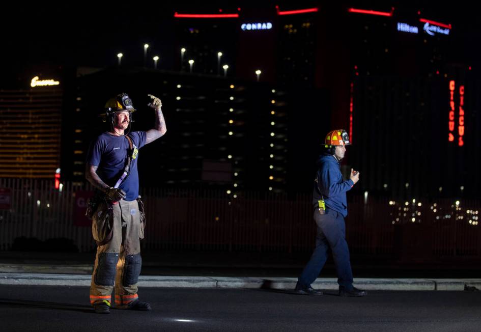 Las Vegas Fire & Rescue respond to people trapped in an elevator during a power outage near ...