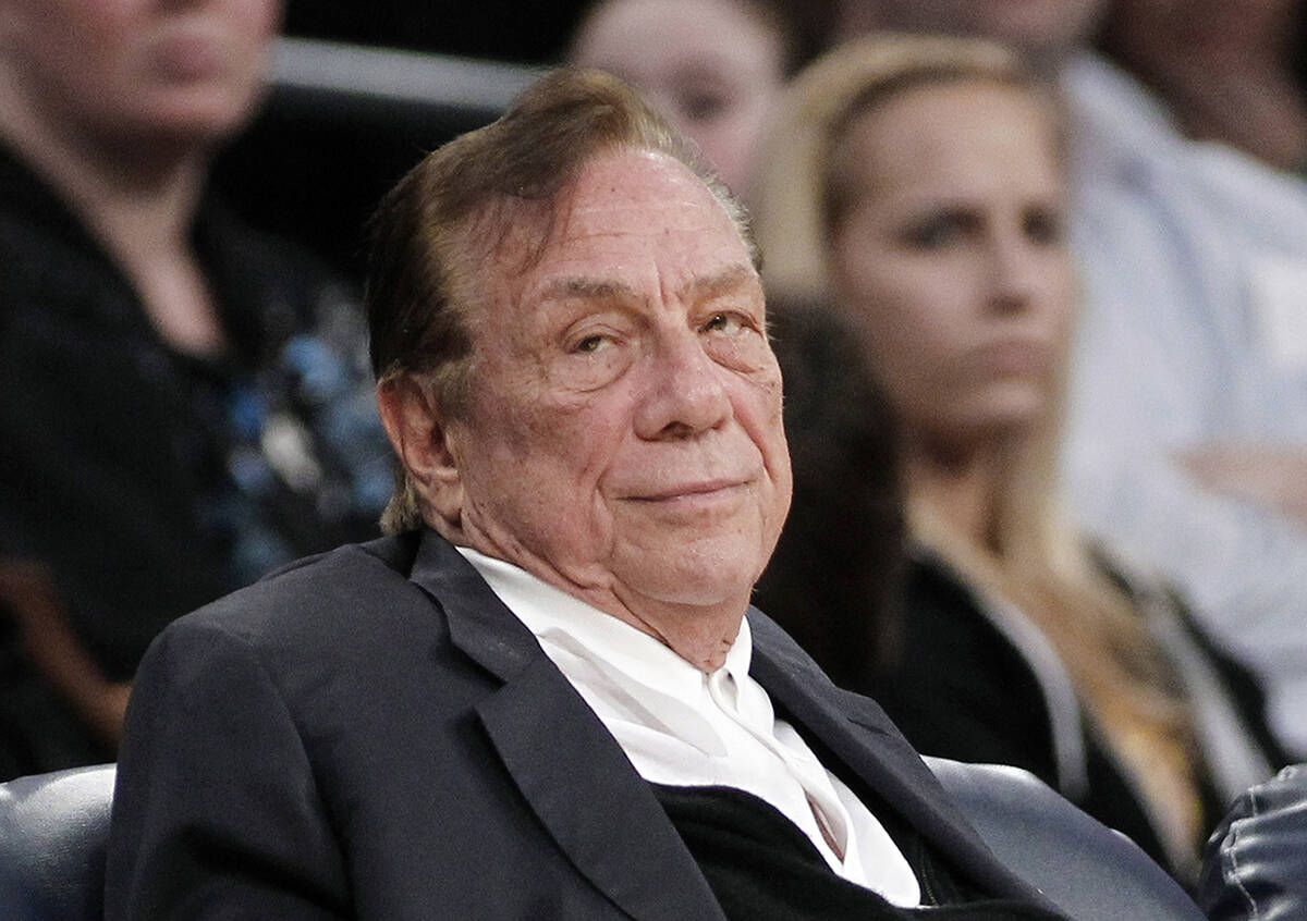 FILE - In this Dec. 19, 2011 file photo, Los Angeles Clippers owner Donald Sterling watches the ...