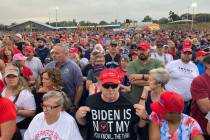 People gather ahead of an appearance by former President Donald Trump at a rally at the Iowa St ...
