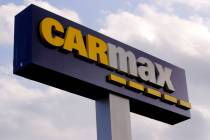 A sign at the CarMax dealership in Manchester, N.H., Thursday, Aug. 15, 2019. (AP Photo/Charles ...