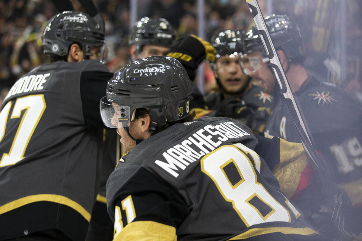 Golden Knights center Jonathan Marchessault (81) skates to celebrate by his teams bench after s ...
