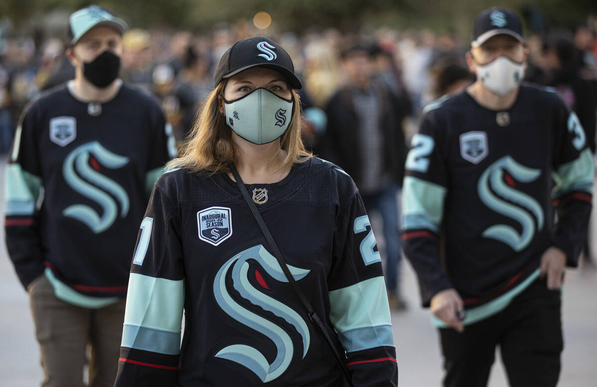 Seattle Kraken fans before the start of an NHL hockey game against the Golden Knights on Tuesda ...