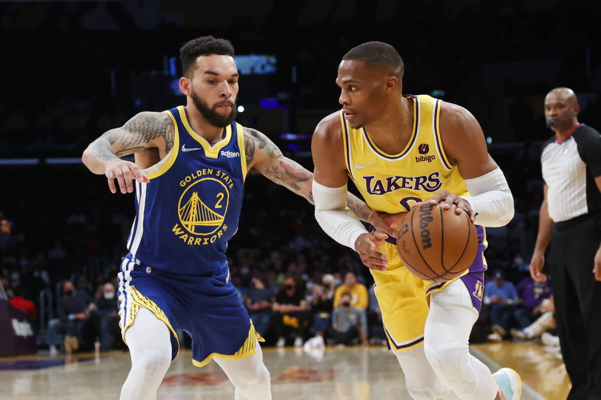 Los Angeles Lakers guard Russell Westbrook (0) drives against Golden State Warriors forward Chr ...