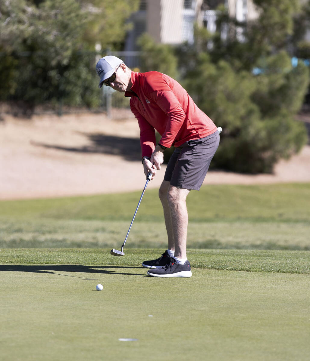 Former UNLV starting quarterback Steve Stallworth makes his putt during Canyon Springs golf cou ...