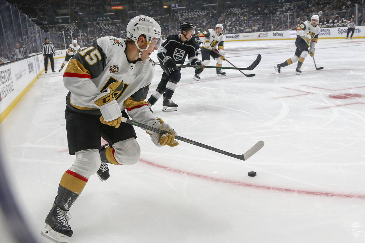 Vegas Golden Knights forward Jake Leschyshyn (15) controls the puck against the Los Angeles Kin ...