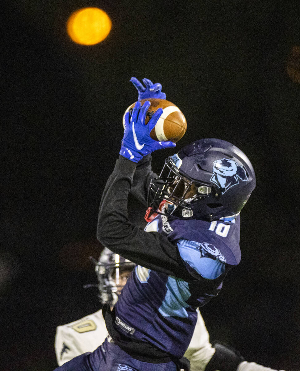 Canyon SpringsÕ Deonte Glaze (10) intercepts a pass intended for FoothillÕs Cole Reed ...