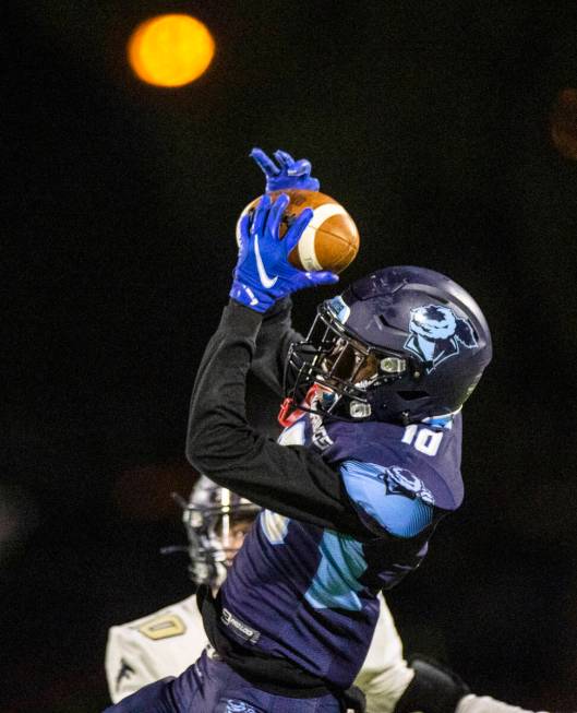 Canyon SpringsÕ Deonte Glaze (10) intercepts a pass intended for FoothillÕs Cole Reed ...