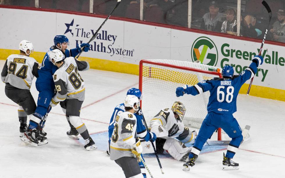 Silver Knights goaltender Logan Thompson (36) gives up a second period gaol to Colorado Eagles ...