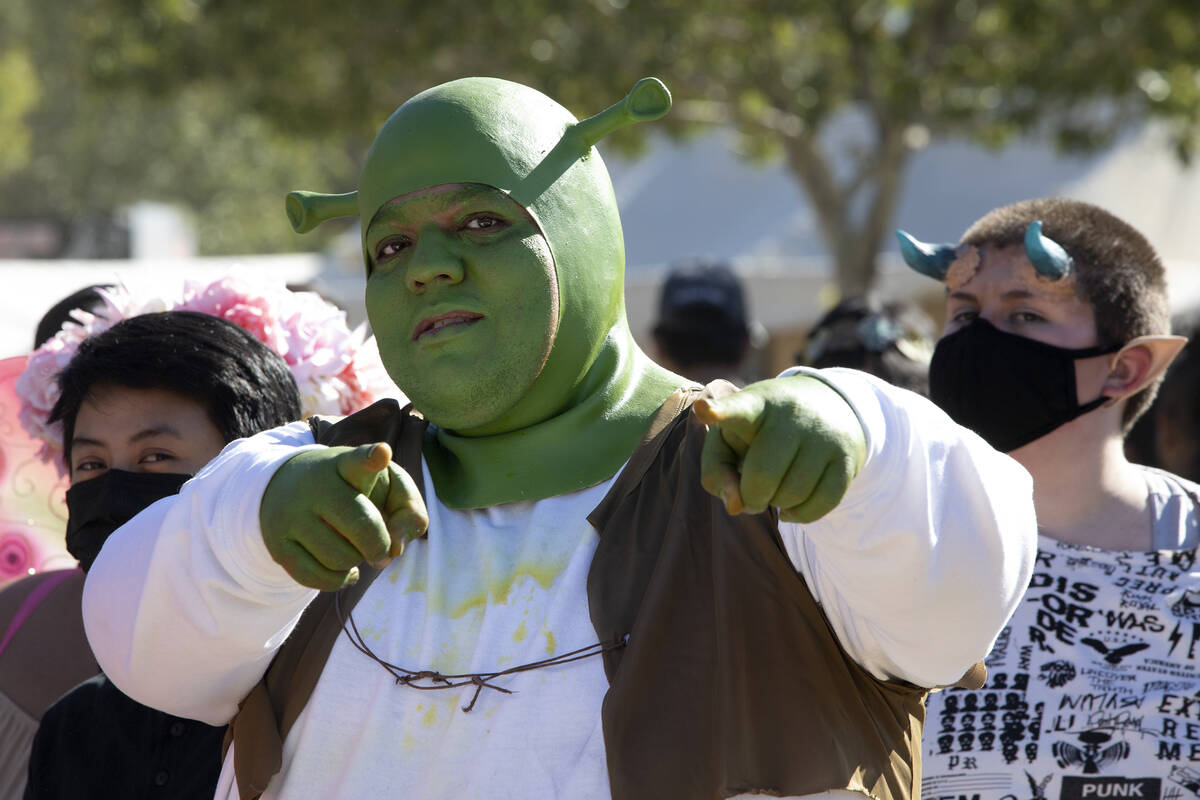 Richard Acosta, of Las Vegas, wears a Shrek costume during the Age of Chivalry Renaissance Fest ...