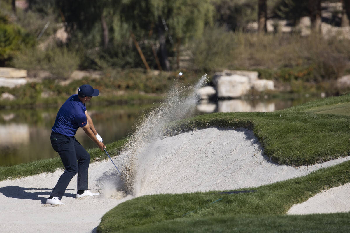 Adam Scott hits the ball from the bunker on the 11th hole during the third round of the CJ Cup ...
