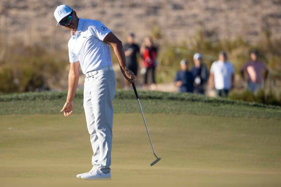 Rickie Fowler watches the ball miss the 18th hole after a putt during the third round of the CJ ...