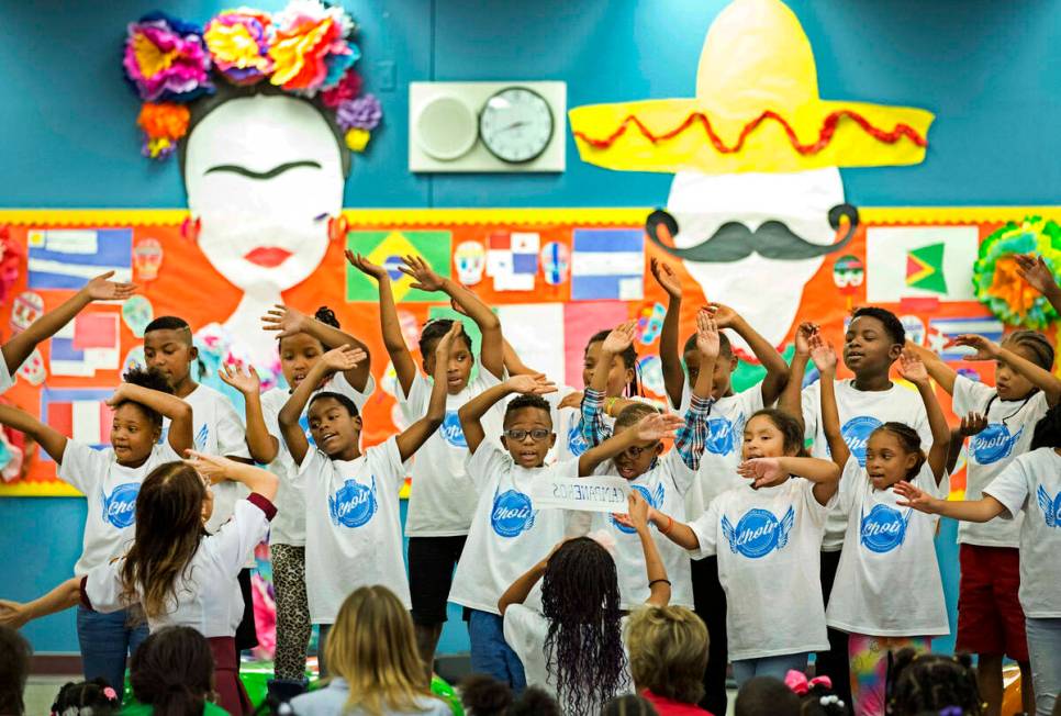 Members of the Wendell P. Williams Singing Eagles Choir perform during a Hispanic Heritage Mont ...