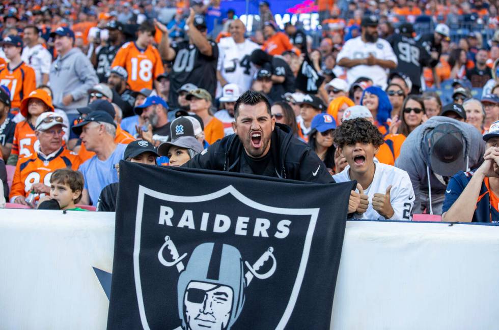 Raiders' fans cheer as the win is near versus the Denver Broncos during the second half of an N ...