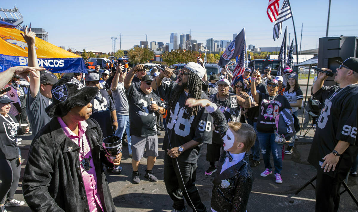 Raider Nation fans enjoy some music by 4 Dub in the tailgate area before the first half of an N ...