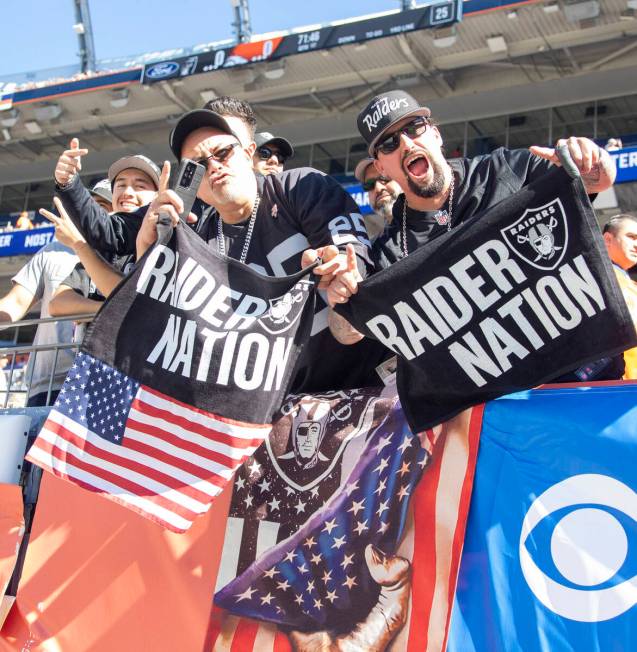 Raiders fans cheer before an NFL football game against the Denver Broncos on Sunday, Oct. 17, 2 ...