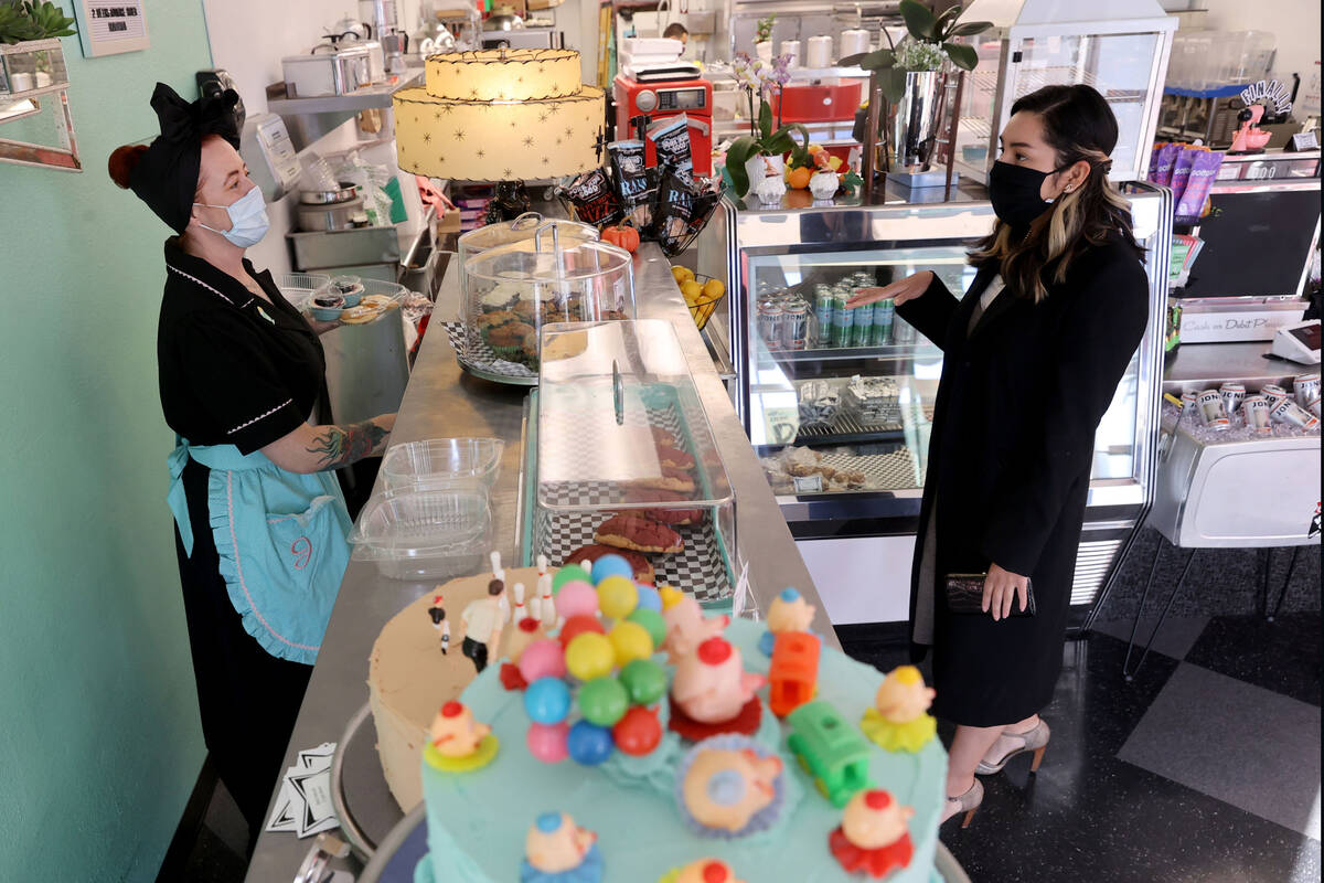 Jill Shlesinger, left, serves Brissa Marquez at her new bakery called Starburst Parlor on West ...