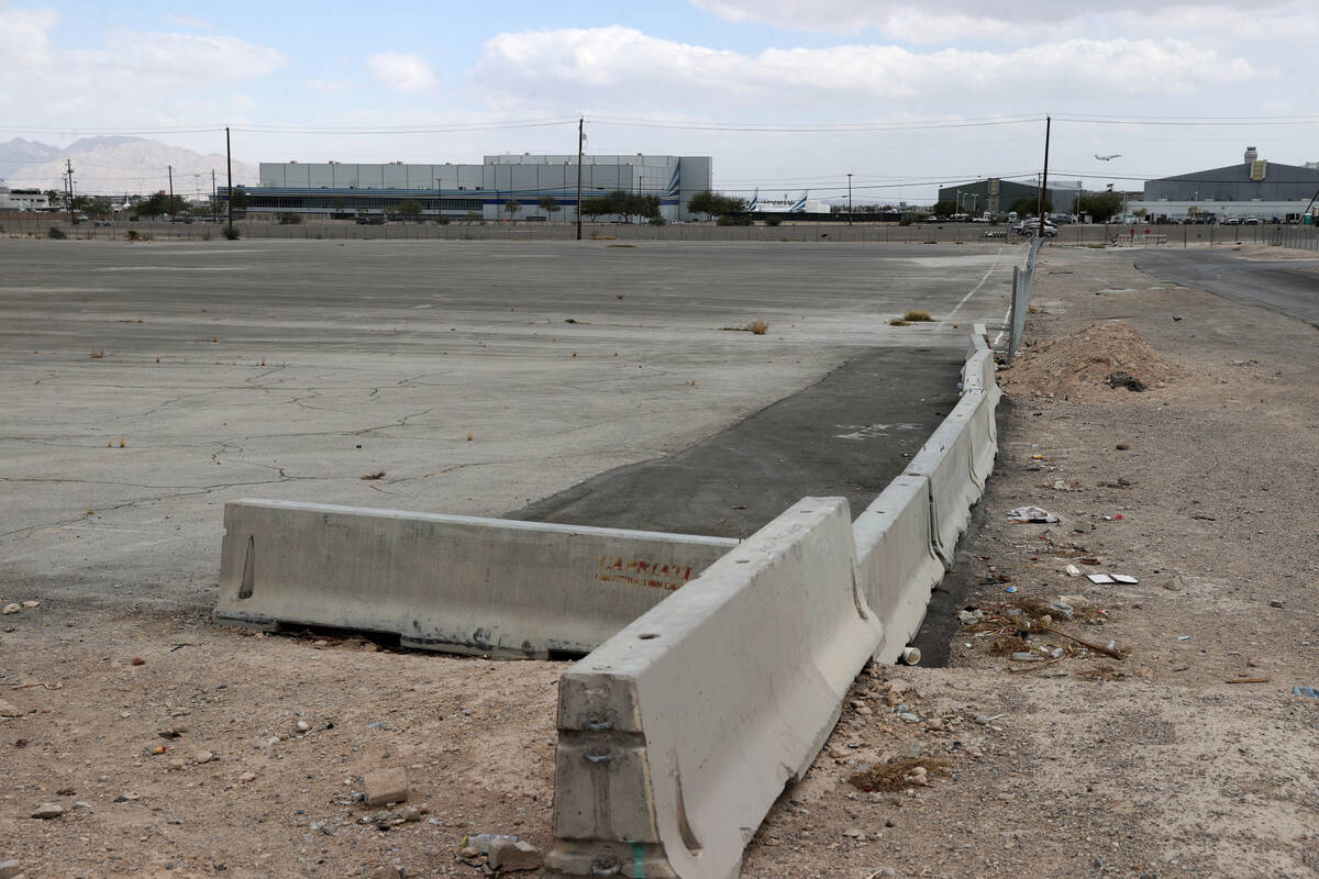 A plane takes off at McCarran International Airports near vacant land at Las Vegas Boulevard an ...