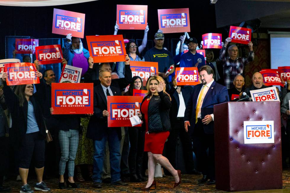 Supporters of Las Vegas Councilwoman Michele Fiore cheer as she announces her gubernatorial cam ...