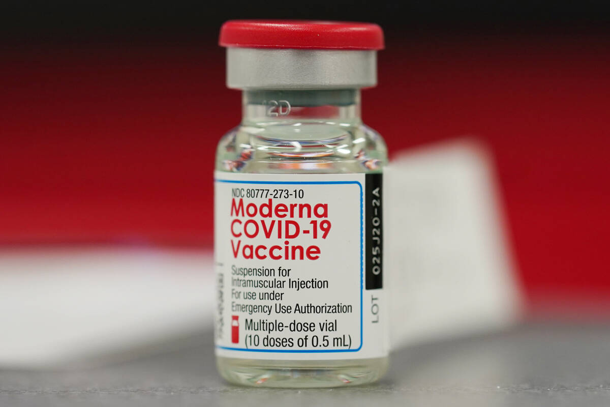 This Dec. 23, 2020 file photo shows a vial of the Moderna COVID-19 vaccine in the first round o ...