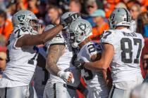 Raiders guard John Simpson (76), Raiders center Andre James (68) and Raiders tight end Foster M ...