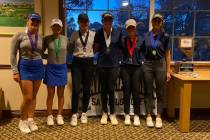 Coronado girls golf team members celebrate Tuesday after winning the Class 5A state championshi ...